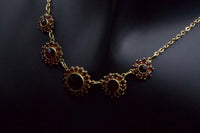 Noir Rosette Garnet Necklace